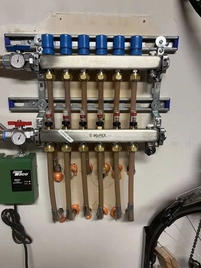 Plumber performing Water Heater Repair at a residential property in Staunton